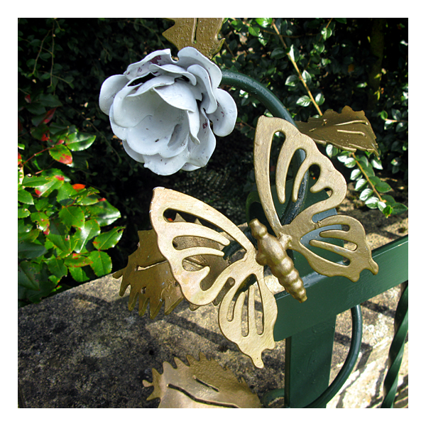 butterfly on seat in village strret at wark